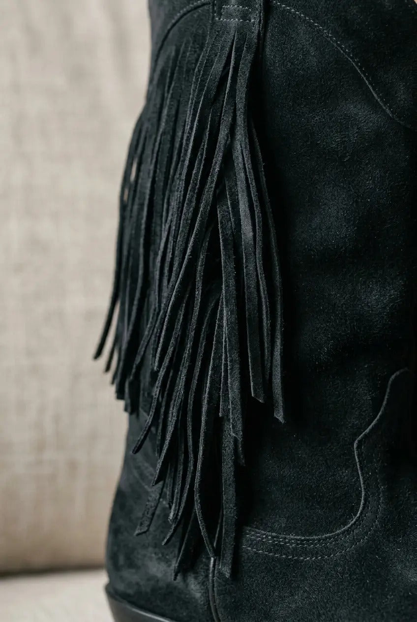 Women's black fringe western boots, back view
