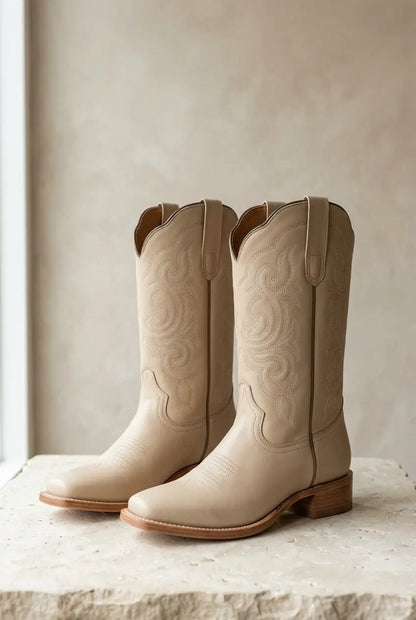 Women's ivory square-toe western boots, front pair view